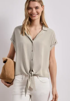 Blouse à épaules tombantes avec col bowling