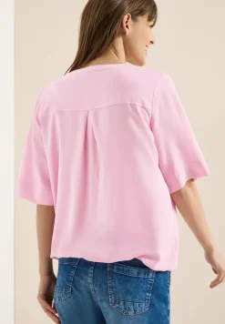 Blouse avec col fendu et ourlet élastique