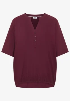 Blouse avec col fendu et ourlet élastique