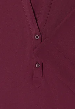 Blouse avec col fendu et ourlet élastique