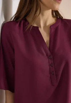 Blouse avec col fendu et ourlet élastique