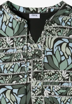 Blouse avec col fendu et mélange de structures