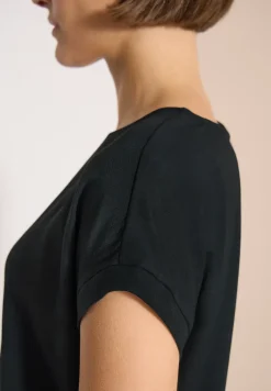 Blouse avec col rond et détail de nœuds