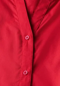 Blouse avec détails en tape