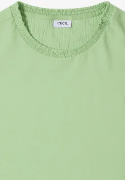 Blouse avec encolure smockée