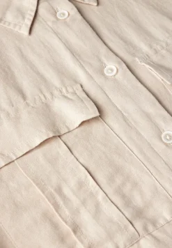 Blouse avec nœud à l'ourlet
