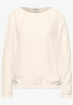 Blouse avec ourlet froncé