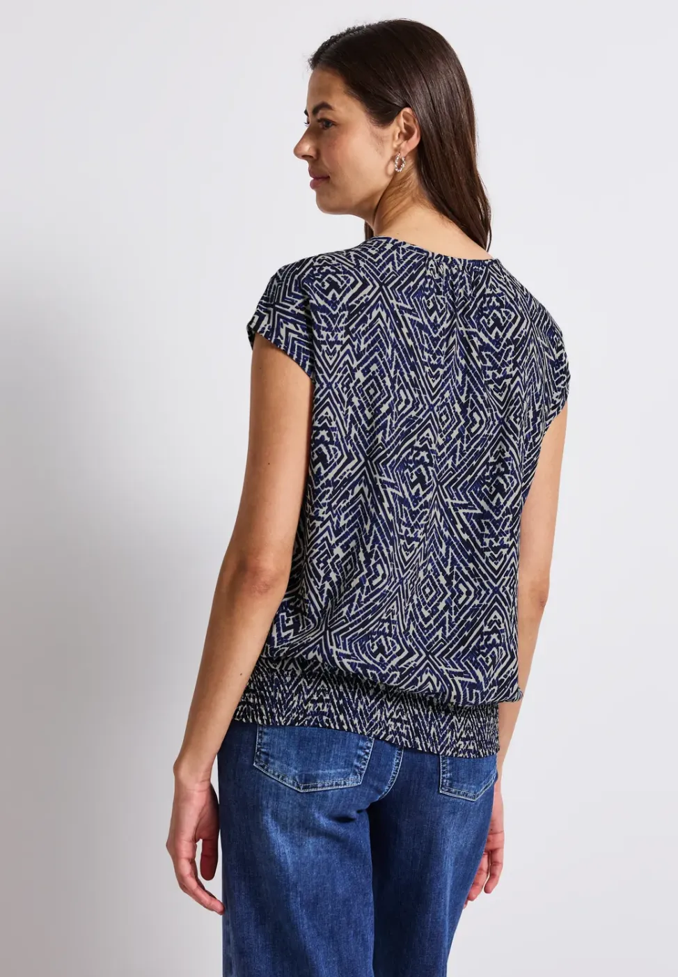 Blouse avec ourlet smocké