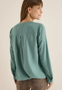 Blouse en couleur unie