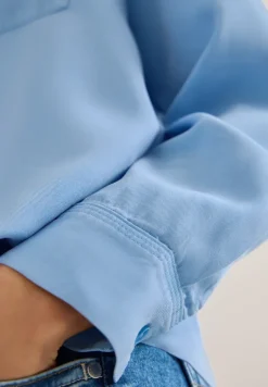 Blouse en denim coloré