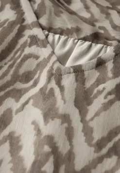Blouse en mousseline de soie avec fronces