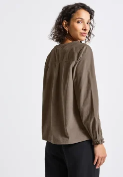 Blouse en velours côtelé avec détails à volants