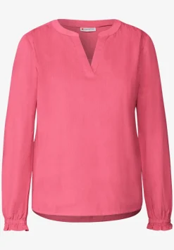 Blouse en velours côtelé avec détails à volants