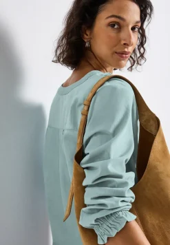 Blouse en velours côtelé avec détails à volants