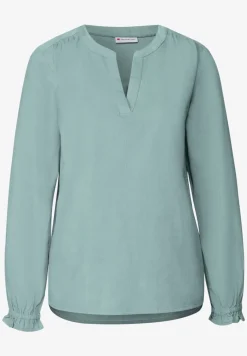 Blouse en velours côtelé avec détails à volants