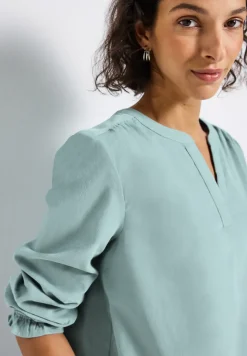 Blouse en velours côtelé avec détails à volants