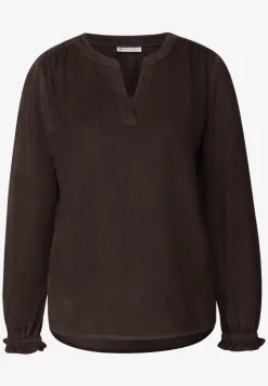 Blouse en velours côtelé avec détails à volants