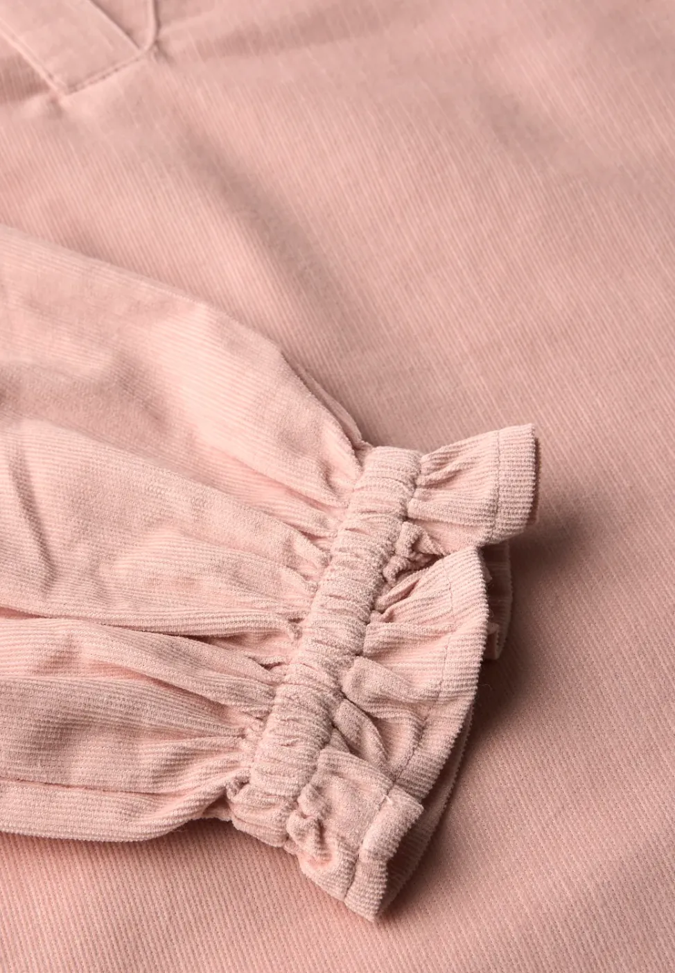 Blouse en velours côtelé avec détails à volants