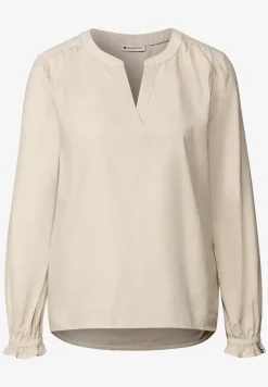 Blouse en velours côtelé avec détails à volants