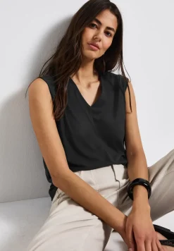 Blouse fluide avec détails élégants