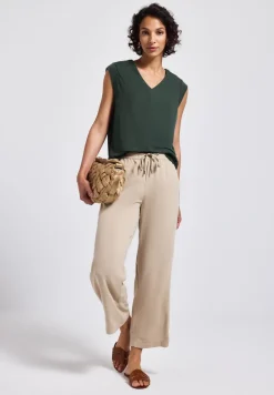 Blouse fluide avec détails élégants