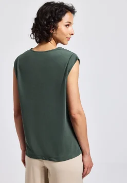 Blouse fluide avec détails élégants