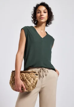 Blouse fluide avec détails élégants