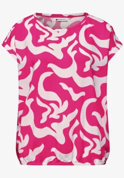 Blouse imprimée à épaules tombantes