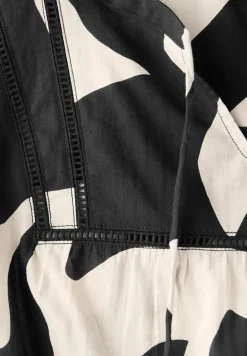 Blouse imprimée avec détails de bandes