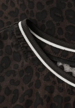 Blouse léopard avec détails en bande