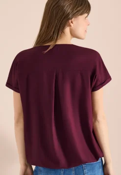 Blouse manches courtes à col fendu