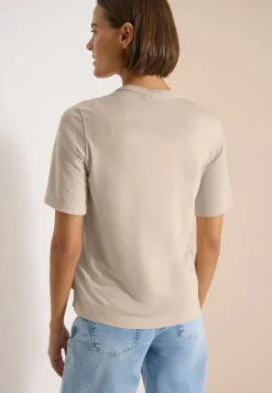 Blouse manches courtes à col fendu et rubans