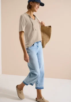 Blouse manches courtes à col fendu et rubans