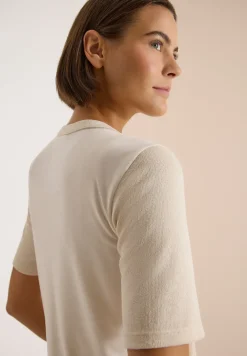 Blouse manches courtes à col fendu et rubans