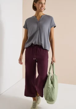 Blouse manches courtes à col fendu