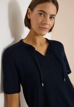 Blouse manches courtes à col fendu et rubans