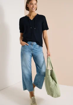 Blouse manches courtes à col fendu et rubans