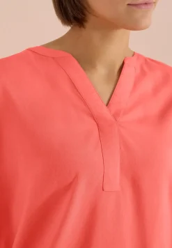 Blouse manches courtes à col fendu
