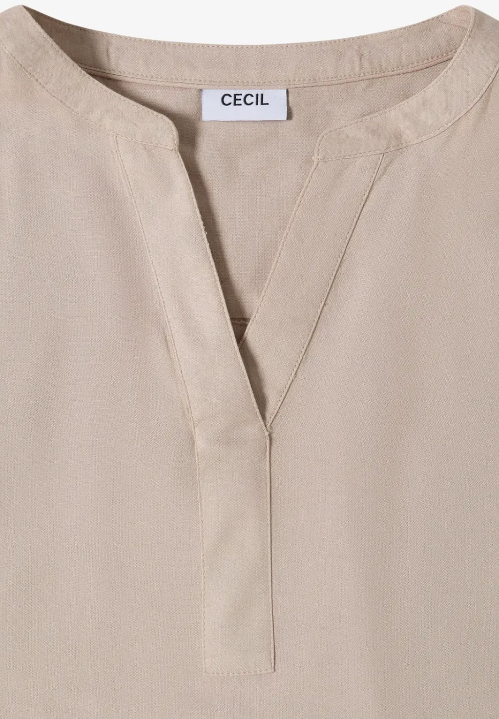 Blouse manches courtes à col fendu