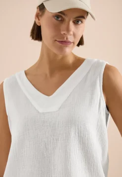 Blouse sans manches col V en mousseline