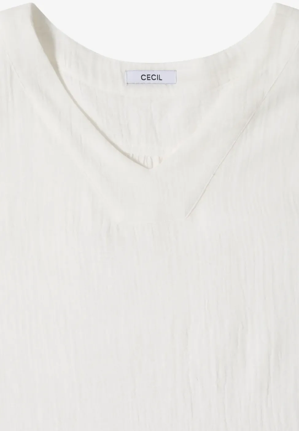Blouse sans manches col V en mousseline