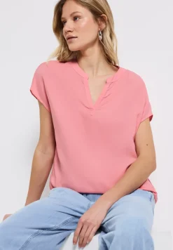 Blouse split neck en couleur unie