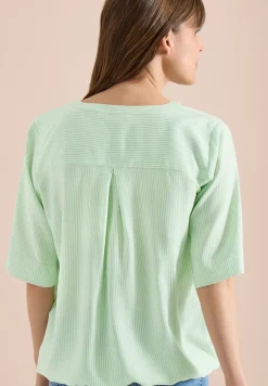 Blouse à manches courtes avec col fendu et rayures