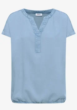 Blouse à manches courtes avec col fendu dans un look denim