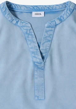 Blouse à manches courtes avec col fendu dans un look denim