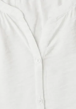 Blouse à manches courtes avec col fendu et boutons