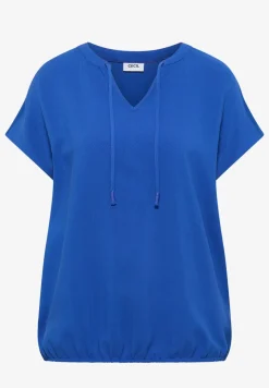 Blouse à manches courtes avec mélange de structures