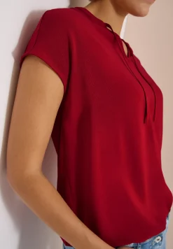 Blouse à manches courtes avec mélange de structures