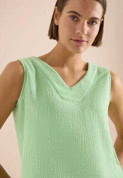 Blouse sans manches col V en mousseline