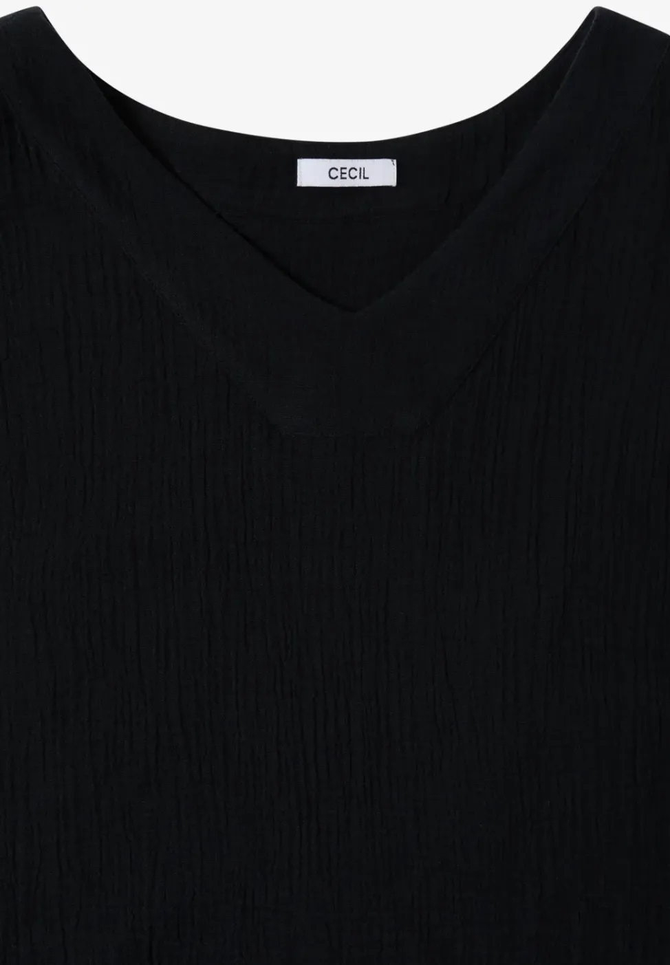 Blouse sans manches col V en mousseline